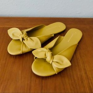 Anthropologie Mustard Yellow Bow Tie Minimalist Leather Sandals Size 6.5 US